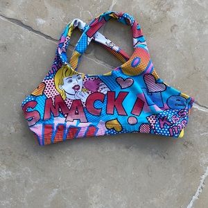 Crazy fun workout brawl, has cartoon characters, bright colors, & a fun vibe.